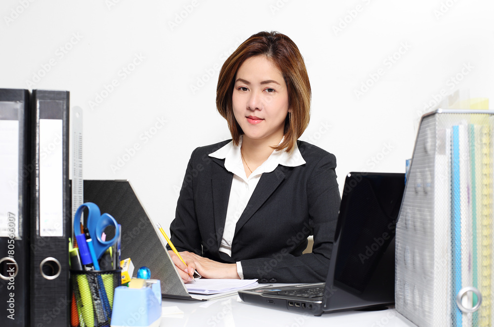 The smart businesswoman asian working in office on the table The smart businesswoman asian working in office on the table