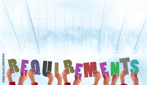Принти на полотні Composite image of hands holding up requirements
