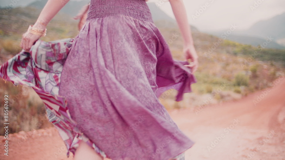 Boho girl walking with a dream catcher as jewelry Boho girl walking with a dream catcher as jewelry