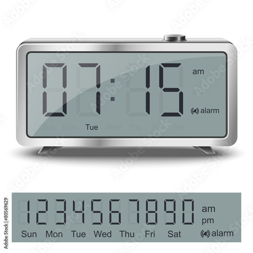 Old style liquid-crystal alarm clock with black numbers