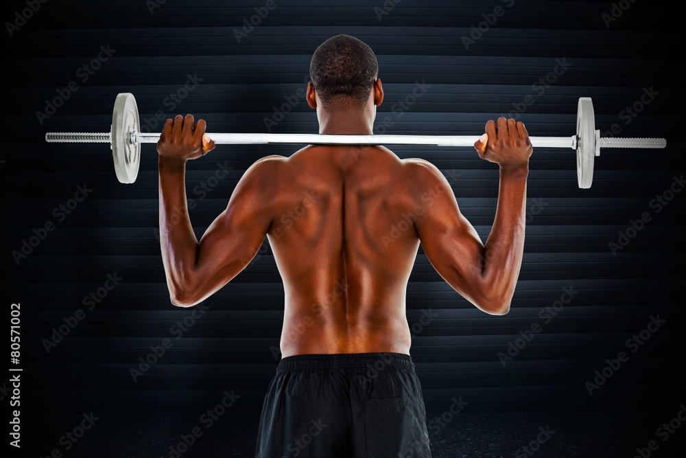 Fit shirtless man lifting barbell Fit shirtless man lifting barbell