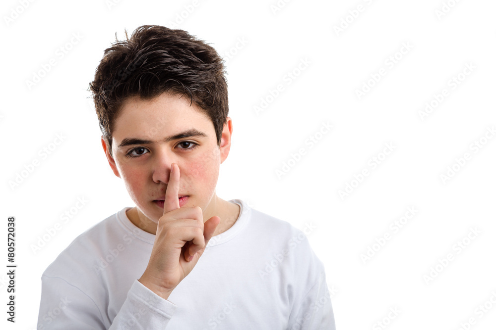 Be silent gesture by Caucasian teenager with acne skin Be silent gesture by Caucasian teenager with acne skin
