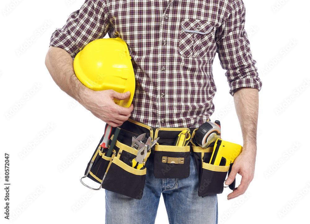 Carpenter with tool belt and hardhat Carpenter with tool belt and hardhat