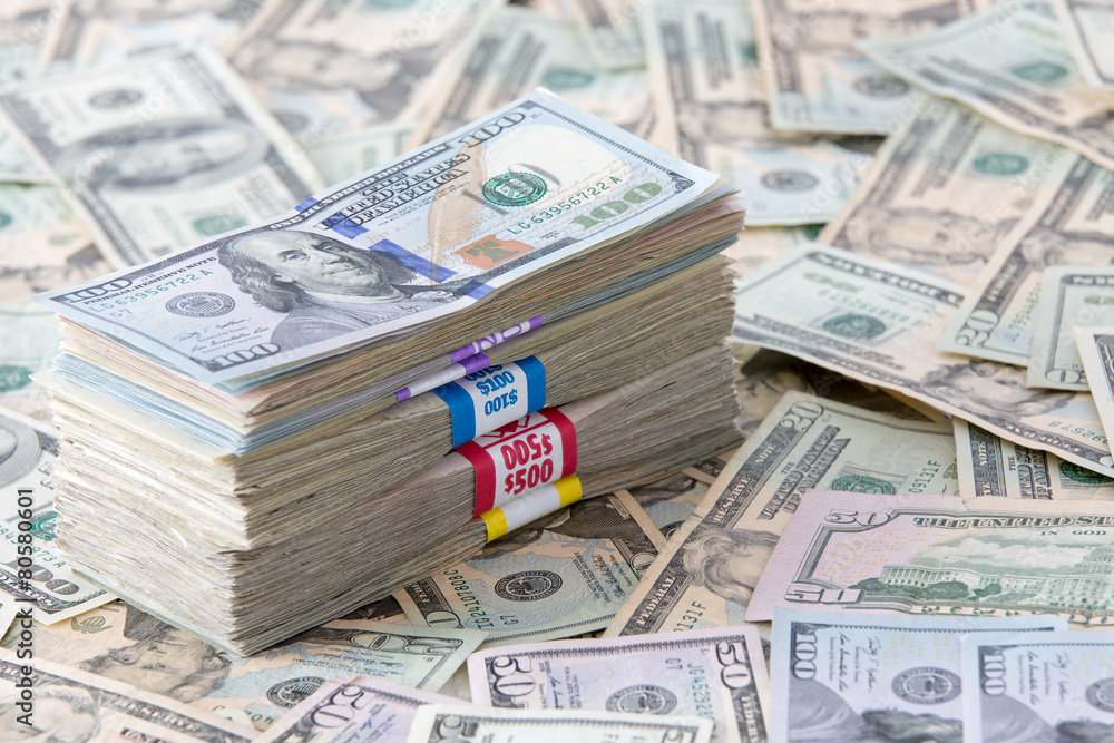 Bundled dollar banknotes, different denominations Bundled dollar banknotes, different denominations