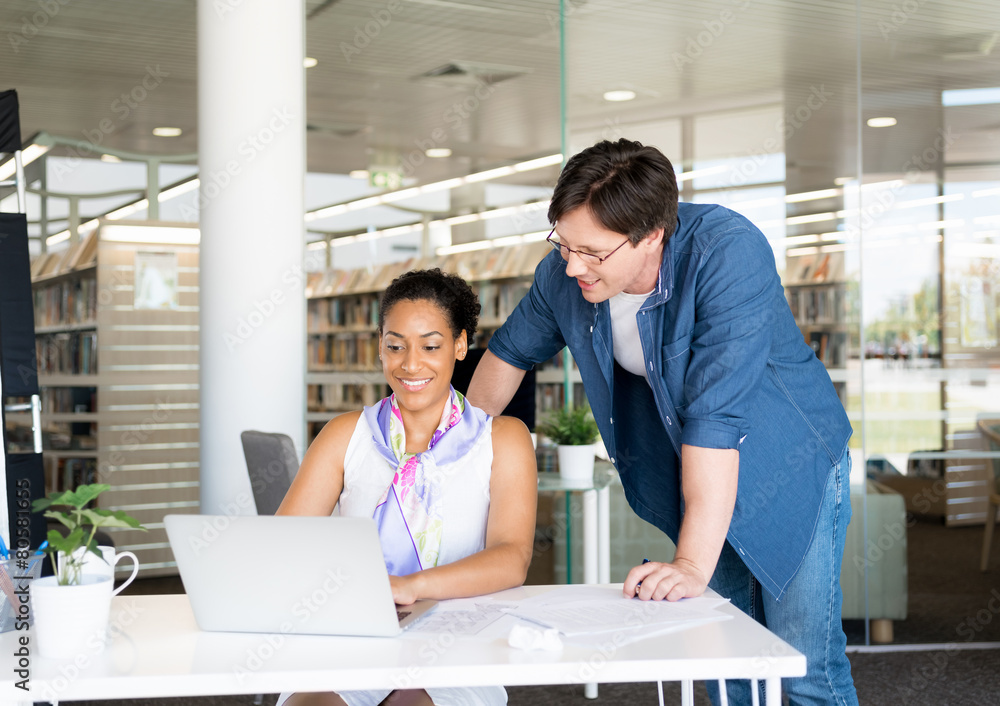 Fototapeta premium Expert is ready to help her with her work