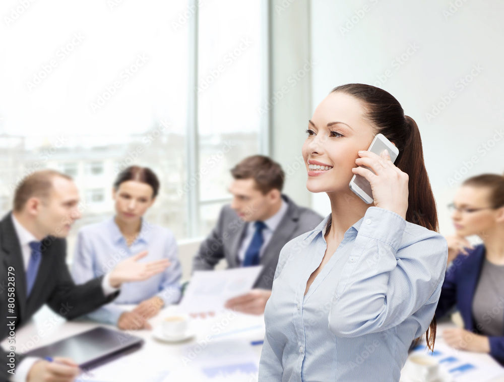 young smiling businesswoman with smartphone young smiling businesswoman with smartphone