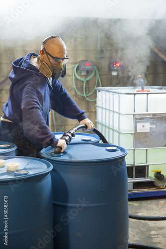 Working Chemical Blender in Corrosive Area of Plant photo