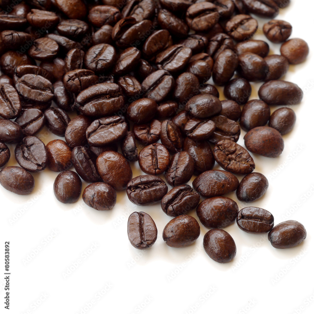Brown coffee beans isolated on white background Brown coffee beans isolated on white background