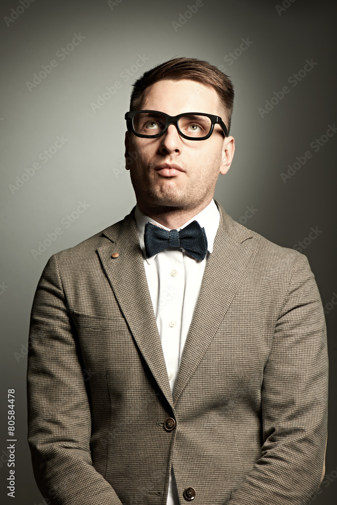 Confident nerd in eyeglasses and bow tie Confident nerd in eyeglasses and bow tie