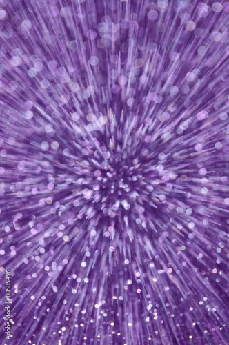 Fototapeta Naklejka Na Ścianę i Meble -  purple glitter explosion lights abstract background