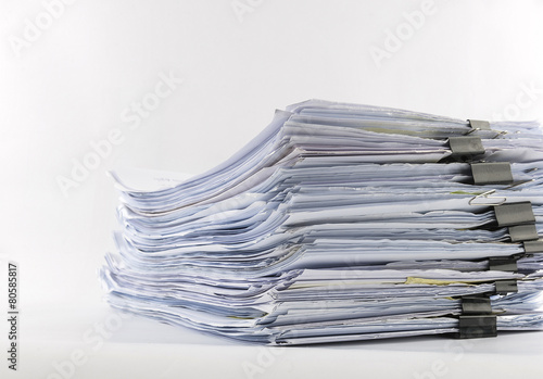 piled up office work papers
