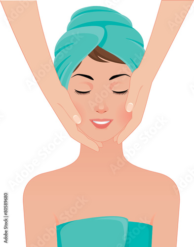 Girl gets a face massage in spa salon