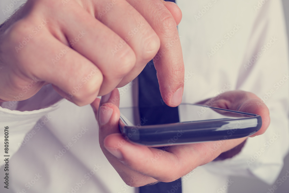 Businessman Clicking his Mobile Phone Screen Businessman Clicking his Mobile Phone Screen