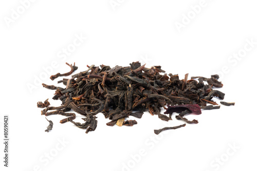 dry black tea leaves isolated on a white background