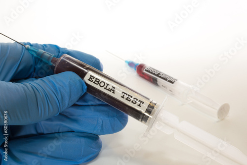 doctor with syringe with blood infected