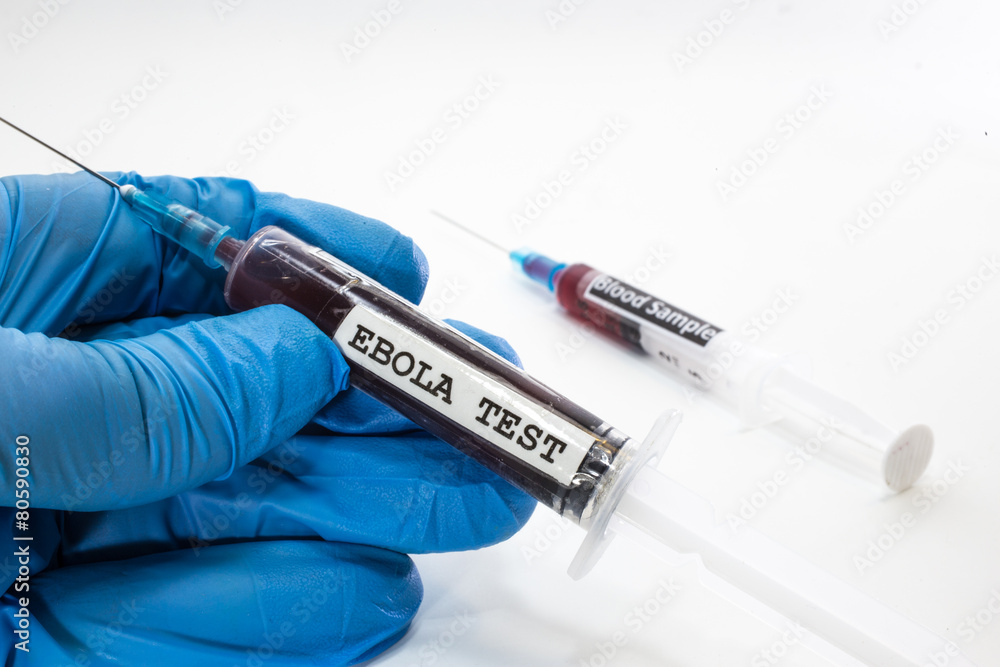 Naklejka premium doctor with syringe with blood infected with ebola virus