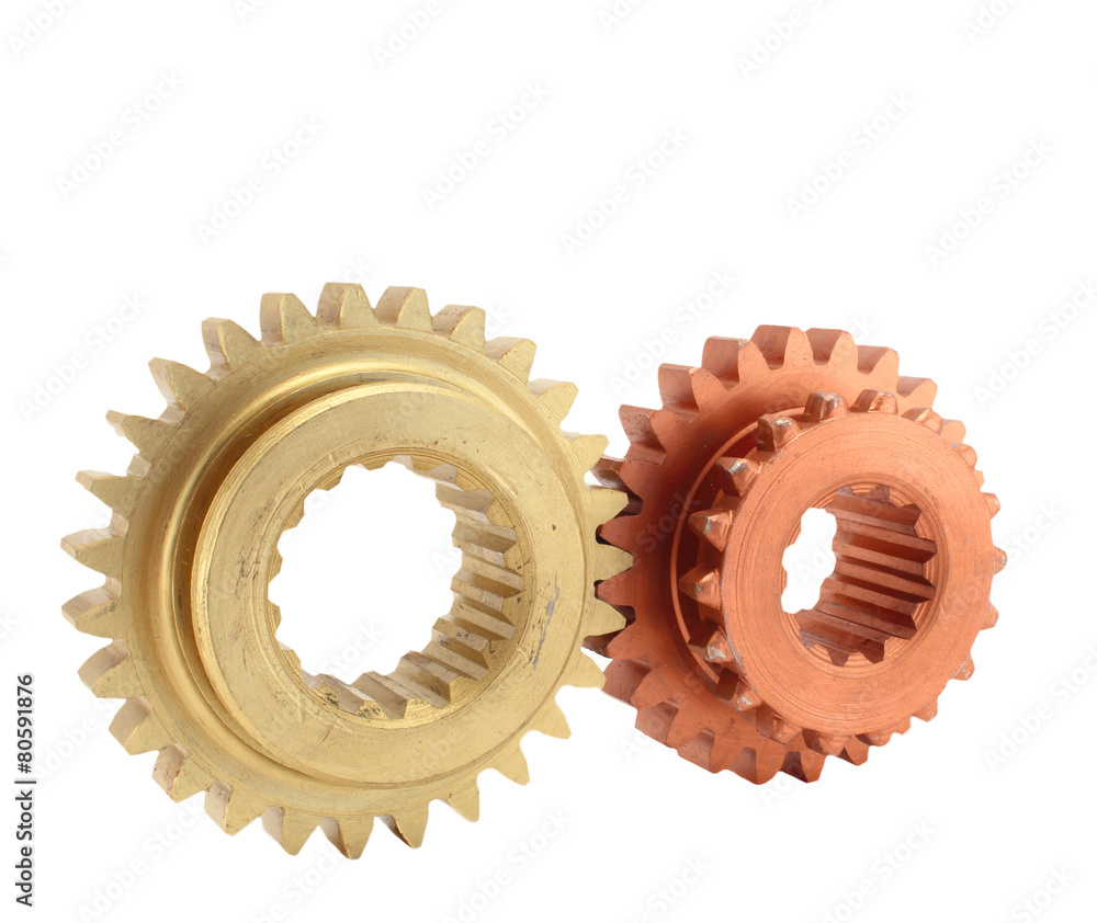 Copper and gold gear isolated on white background Copper and gold gear isolated on white background