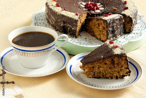 dates cake with chocolate icing and coffee