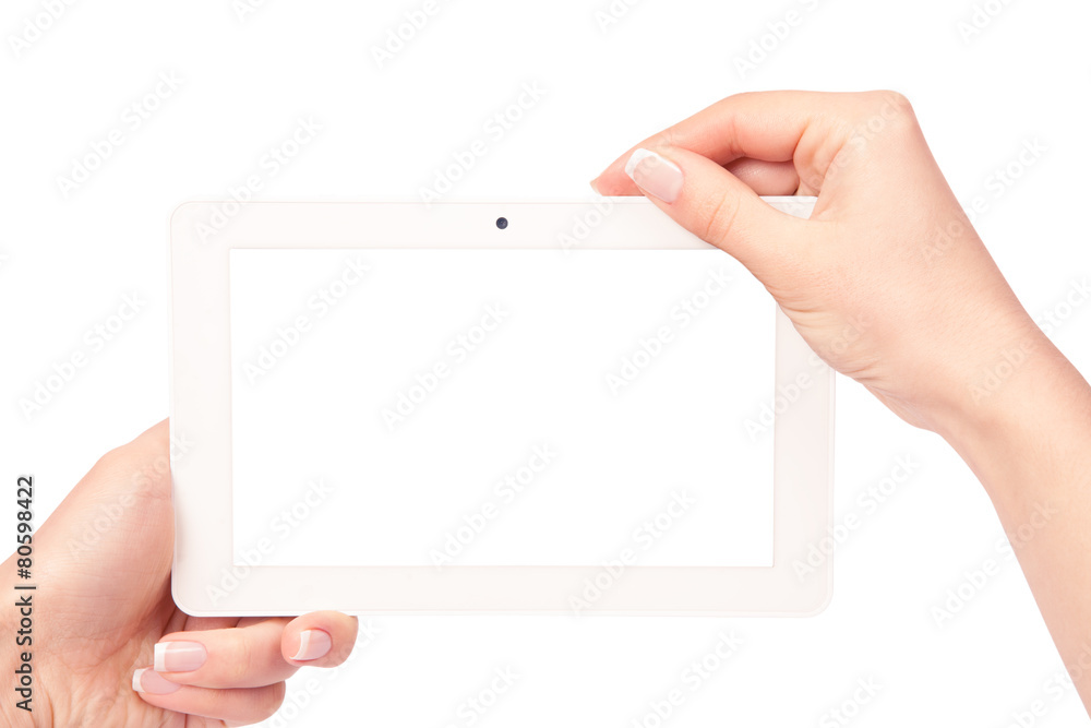 Obraz premium tablet computer isolated in a hand on the white backgrounds