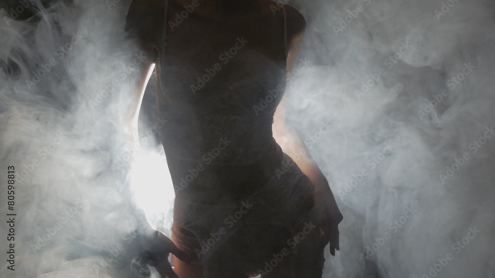 Young girl posing nude, smoke, slow-motion Stock ビデオ | Adobe Stock