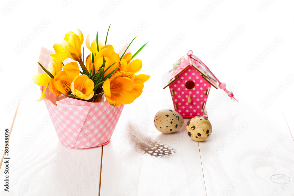 table decoration with easter eggs nest on plate, on white wooden table decoration with easter eggs nest on plate, on white wooden