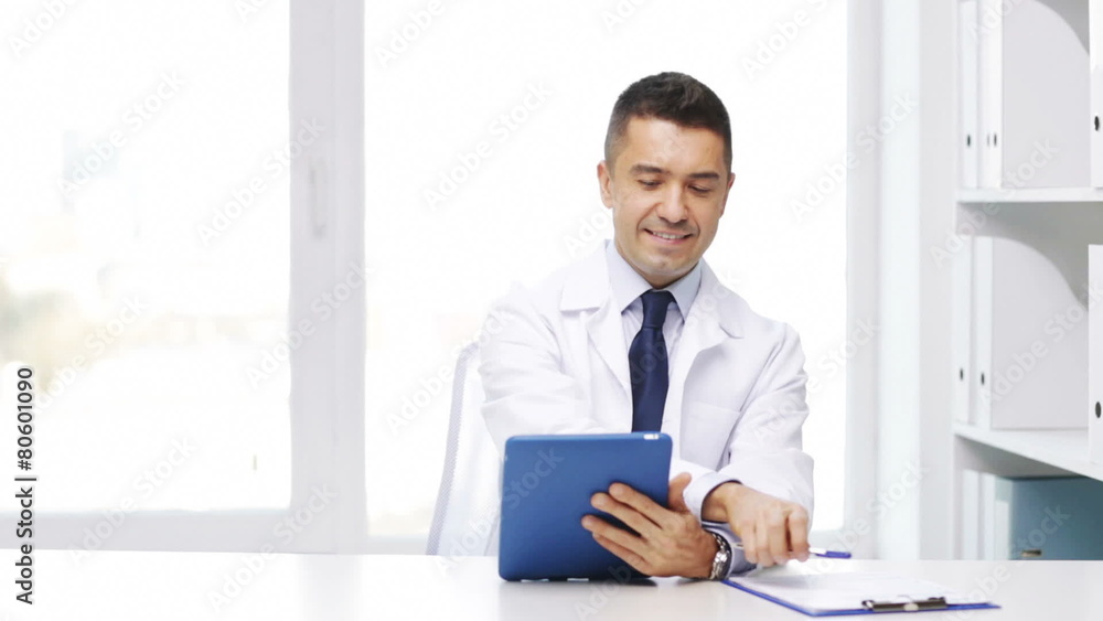 doctor with tablet pc and clipboard in hospital