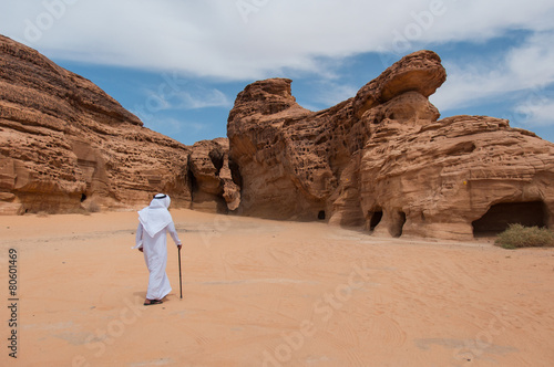 Saudian walking in Madaîn Saleh archeological site, Saudi Arabi photo