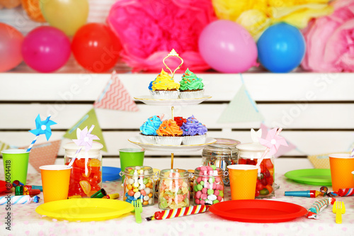 Prepared birthday table with sweets for children party