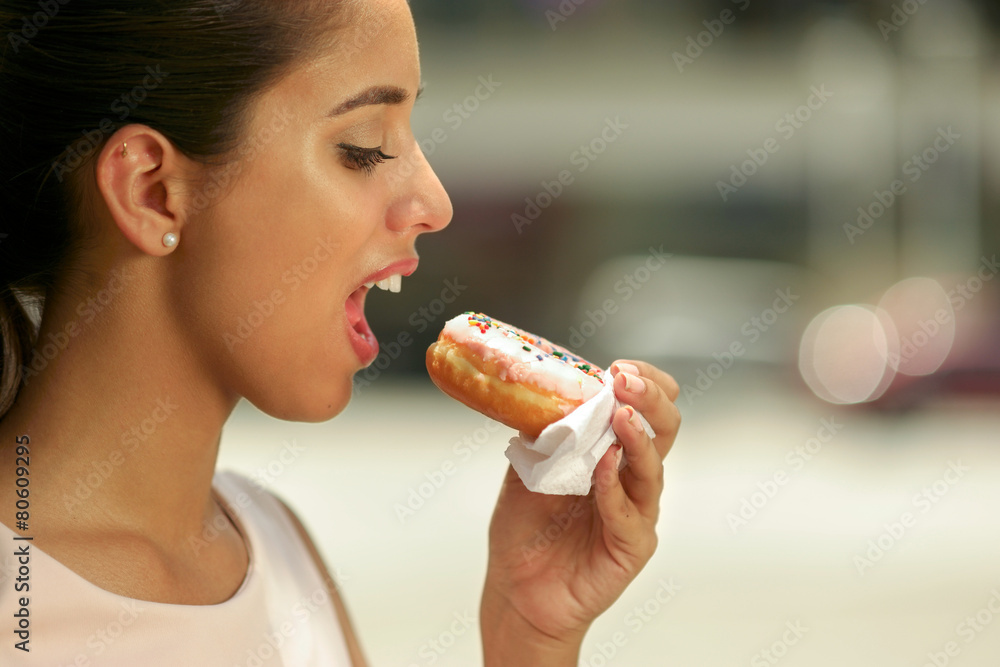 Business Woman Eating Delicious Donut In Street Business Woman Eating Delicious Donut In Street