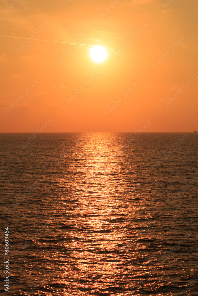 Yellow Sunset in The Middle of The Ocean
