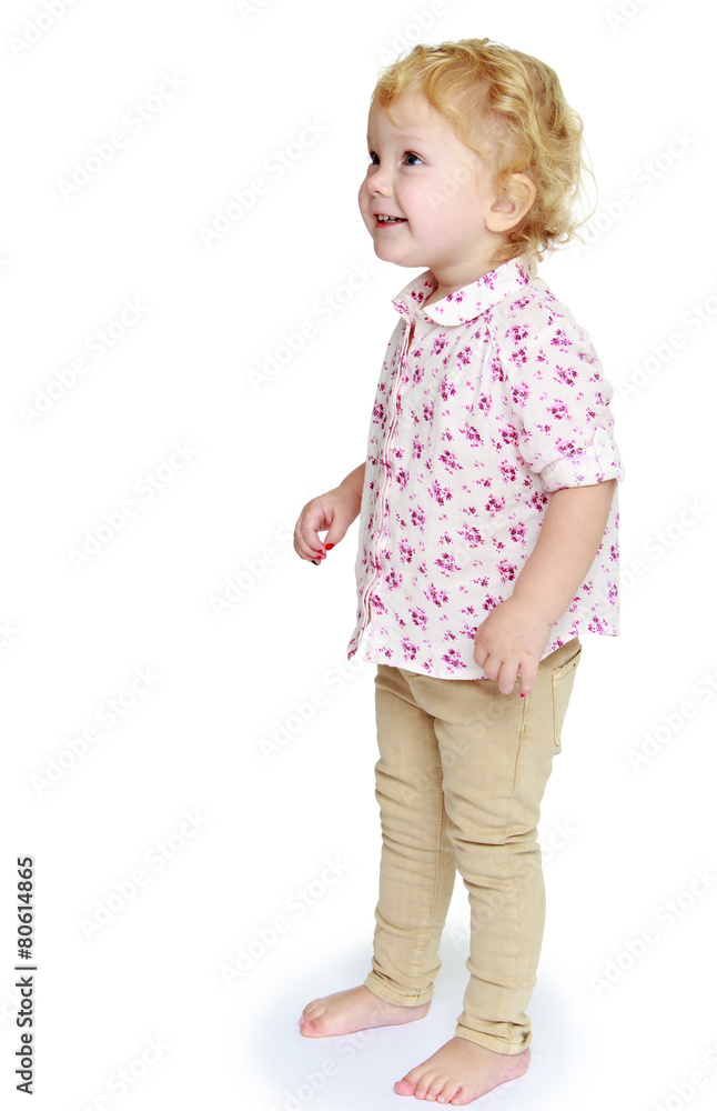 Adorable little girl photo in full growth.