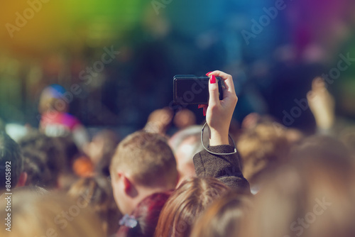 Fans Photographing Music Band Live Performing on Stage