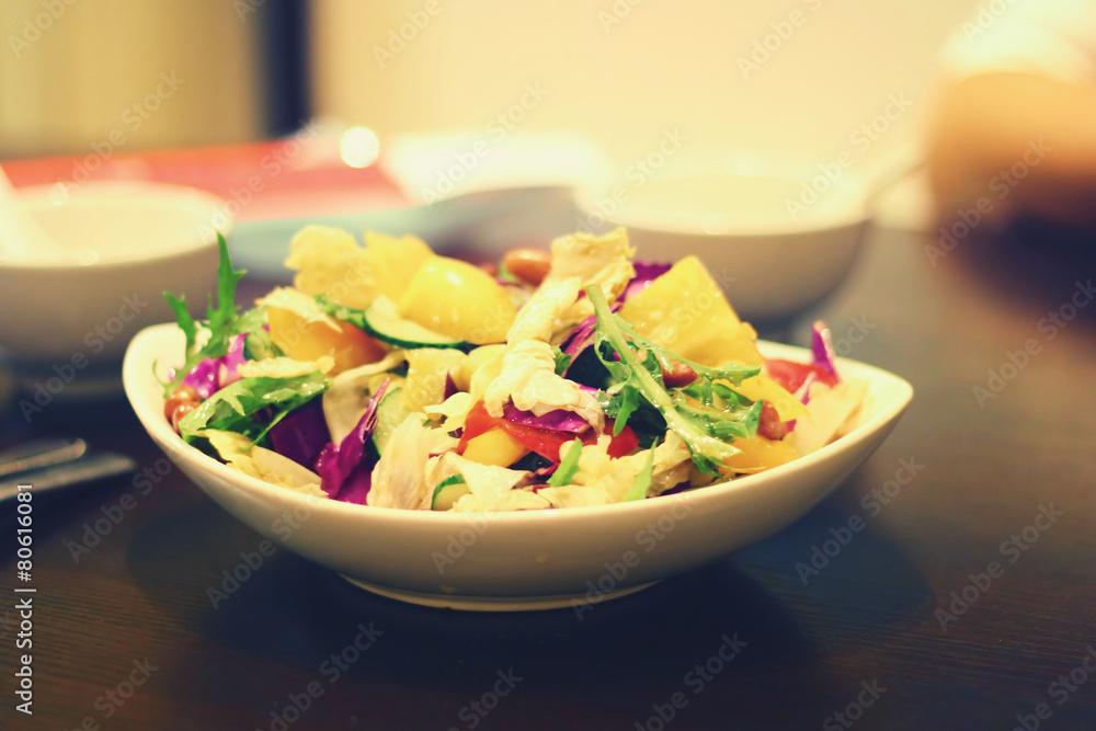 Asian delicious salad with fresh vegetables, lemon and nuts fro Asian delicious salad with fresh vegetables, lemon and nuts fro