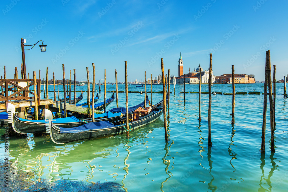 Venice with gondolas on Grand Canal against San Giorgio Maggiore