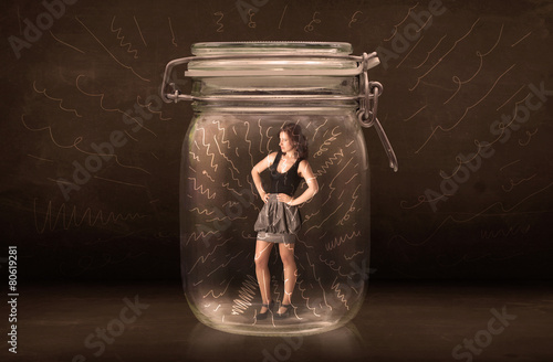 Businesswoman inside a jar with powerful hand drawn lines concep