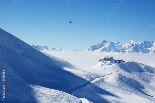 Cable car station on the top of swiss mountains with mont blanc photo