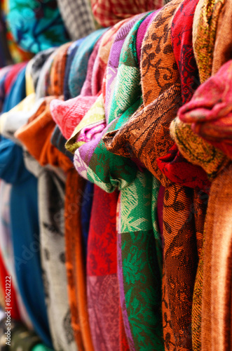 Various colorful scarves hanging at street bazaar in Istanbul