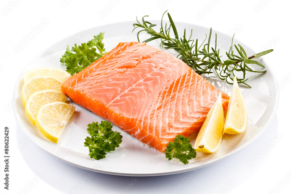 Fresh raw salmon steak on white background Fresh raw salmon steak on white background