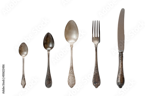 Vintage cutlery on the white background