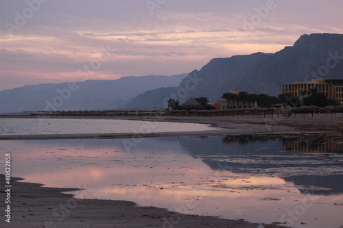 Красивый закат у подножия гор на побережье у Красного моря photo