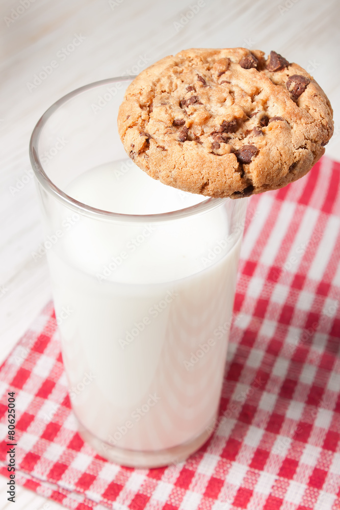 Chocolate cookie and glass of milk Chocolate cookie and glass of milk