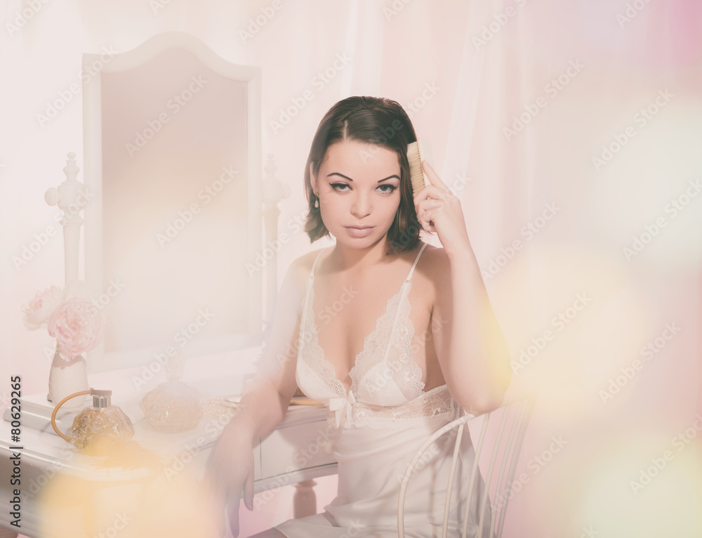 Seductive Girl Wearing Nightie Brushing her Hair Seductive Girl Wearing Nightie Brushing her Hair