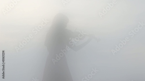 Shadow of a Young Woman Playing the Violin