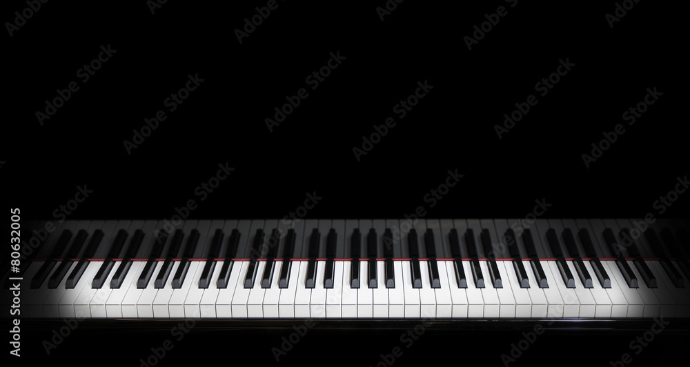 Fototapeta premium piano keys on black piano