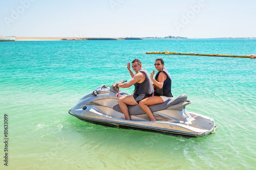 Couple on the jetski at the beach of Abu Dhabi, UAE © Patryk Kosmider