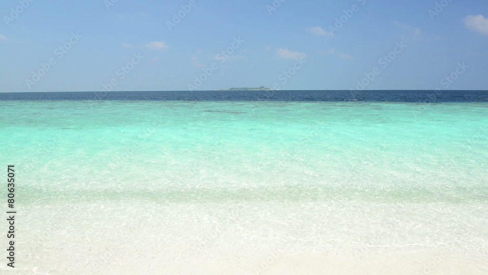 Sand beach and ocean wave, South Male Atoll. Maldives Sand beach and ocean wave, South Male Atoll. Maldives