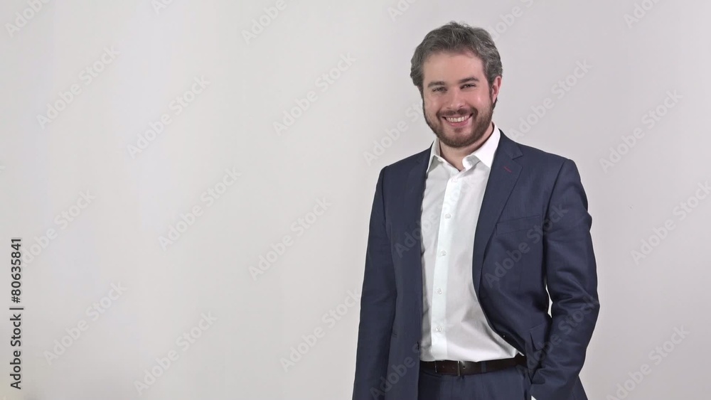 Smiling man with hand in pocket Smiling man with hand in pocket
