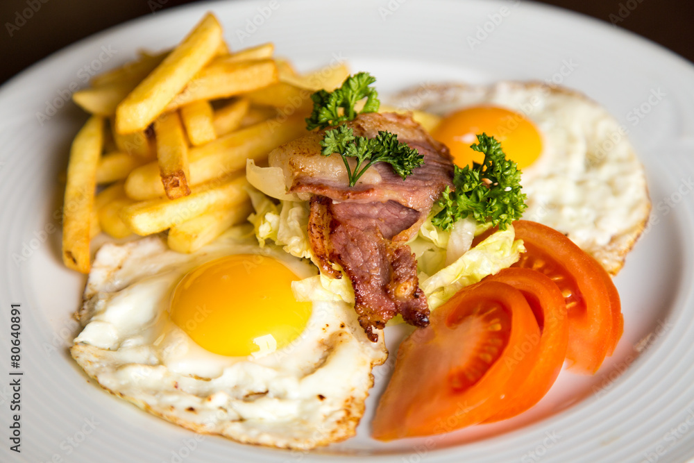closeup american breakfast with fried potato bacon eggs closeup american breakfast with fried potato bacon eggs