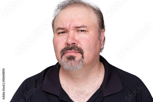 Puzzled middle-aged man with a goatee