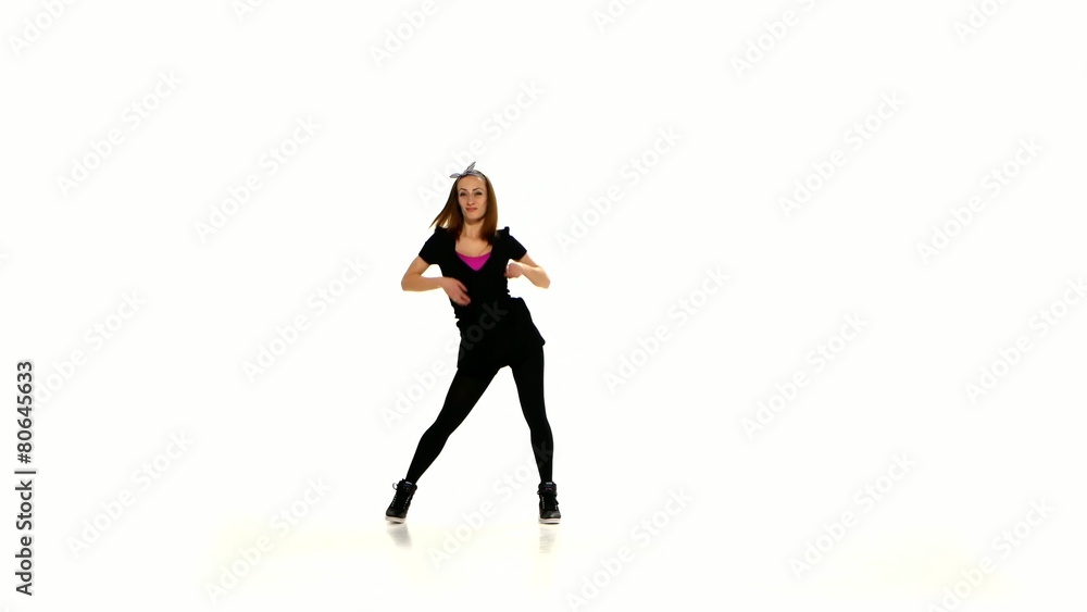 Beautiful red girl in black clothes dancing jazz-funk vogueing Beautiful red girl in black clothes dancing jazz-funk vogueing